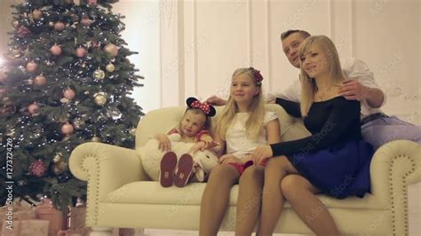 Christmas family photo shoot indoors Stock Video | Adobe Stock