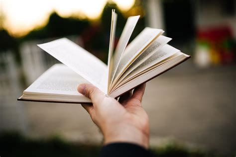 Man Holding An Open Book In His Hand Ivan Radic Flickr