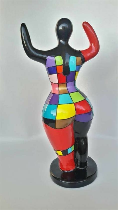 Colorful Ceramic Sculpture On Black Stand