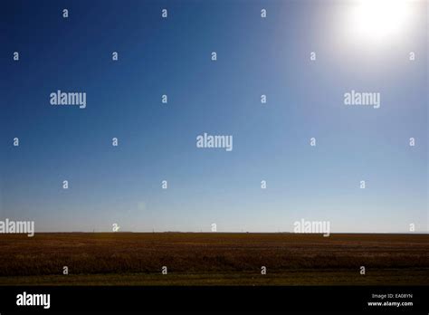 Sun Beating Down On Harvested Bare Prairie Wheat Fields Near Rosetown