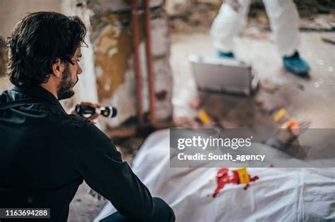 Detective And Forensics On Crime Scene High-Res Stock Photo - Getty Images