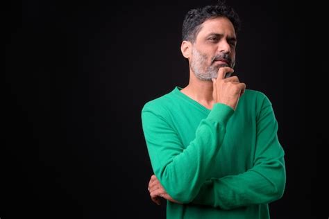 Premium Photo Mature Handsome Bearded Indian Man With Curly Hair