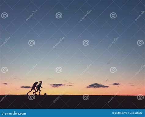 Kids Playing Soccer At Sunset Stock Image Image Of Sports Soccer