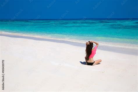 Happy Brunette Woman Enjoying On Exotic Beach In Summer By Tropi Stock