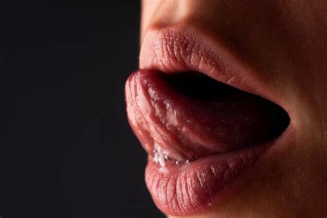 Premium Photo Sexy Tongue Lick Close Up Cropped Image Of Female Face