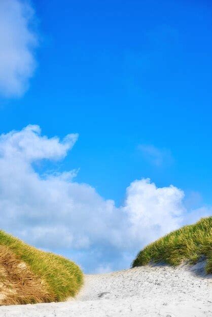 Premium Photo Landscape Of Sand Dunes Under Cloudy Blue Sky Copy