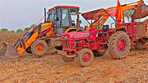 JCB 3dx Eco Excellence Backhoe Machine Loading Red Mud In Mahindra And