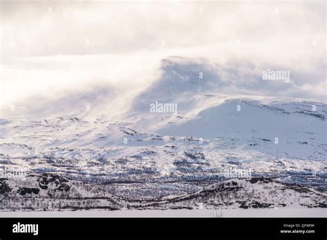 Winter landscape with high mountains with snow and sunny weather in ...