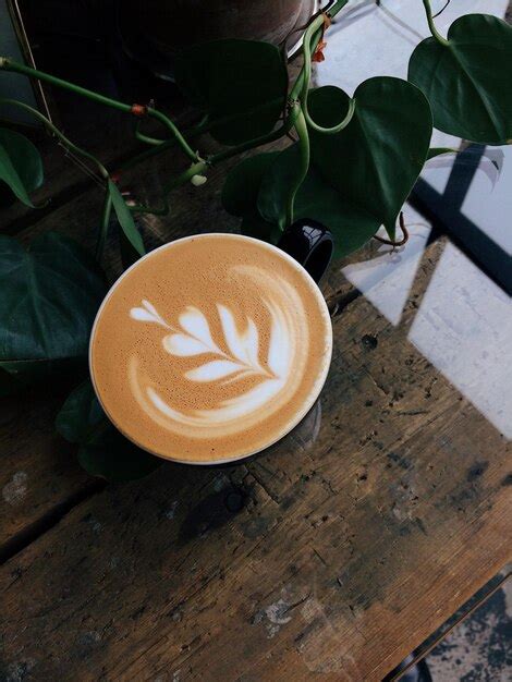 Premium Photo High Angle View Of Coffee On Table