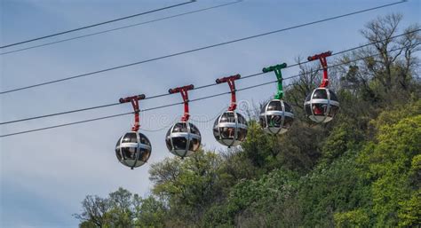 Gondola Bubbles Against The Blue Sky Cable Car Taking Tourists To Fort