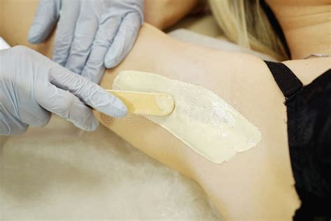 Hair Removal From Beautiful Female Legs Waxing In A Beauty Salon Stock