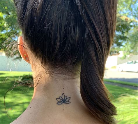 lotus flower tattoo | Neck tattoos women, Flower neck tattoo, Back of neck tattoo