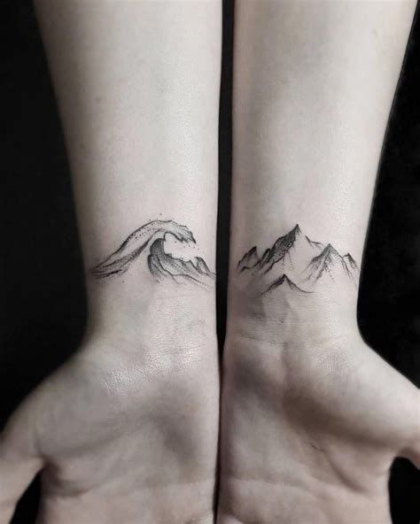 Matching Wave And Mountain Tattoos On The Inner Wrist Tattoo Artist