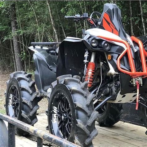 Msa Wheels M Vibe Atv In Orange And Black On Wooden Platform