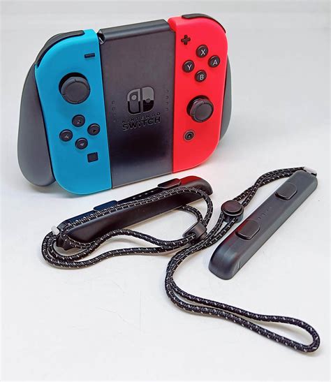 Acessório Joy Con L R Neon Red Neon Blue Grip Straps SWITCH