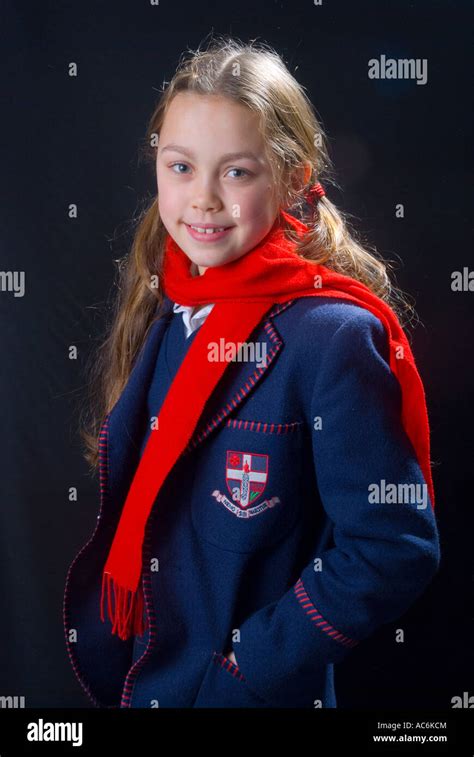 Young schoolgirl in private school uniform and red scarf Stock Photo - Alamy