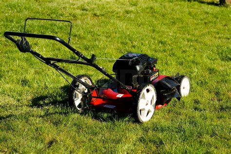 Lawn Mower On Grass Stock Photo Colourbox