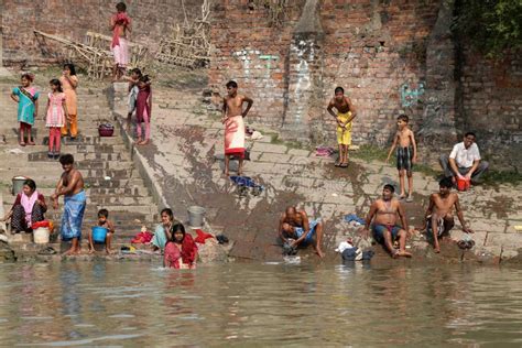 Hindu People Bathing In The Ghat Near The Dakshineswar Kali Temple In