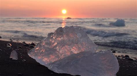 Climate Change Diamond Beach Iceland Iceberg With Waves Crashing On