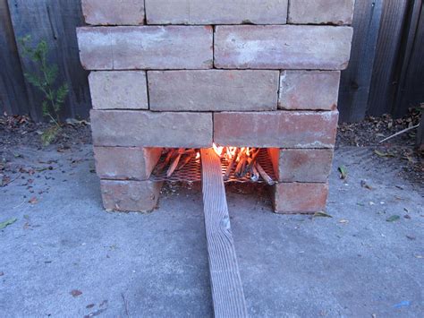 Build A Rocket Stove Rocket Stoves Outside Fire Pits Build A Rocket