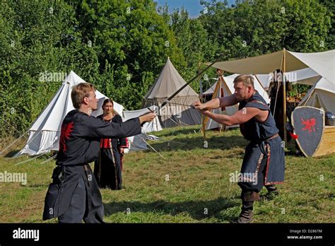 Medieval Sword Fighting Medieval Camp On The Meadows In Front Of