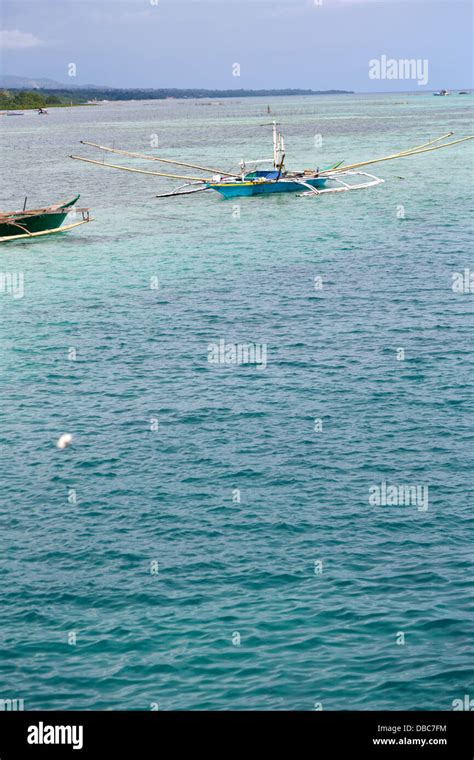 Traditional Fisherman Boats At Alona Beach On Cebu Island Philippines