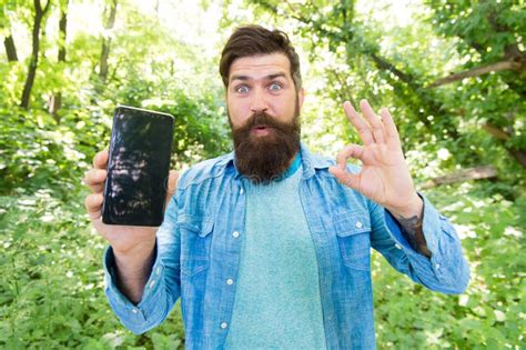 New Technology Surprised Bearded Man Hold Phone Mature Hipster With