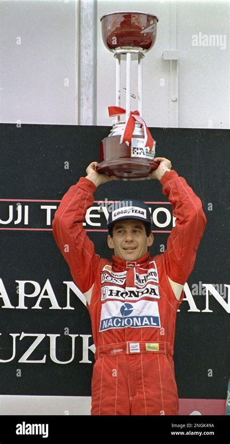 Ayrton Senna Holds Trophy Aloft October 30 1988 After He Won The