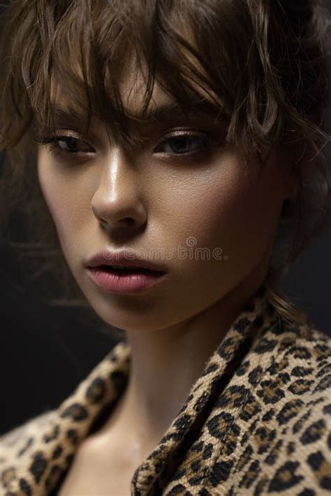 Low Light Photo Of A Beautiful Girl Looking Down With Perfect Skin Professional Nude Make Up