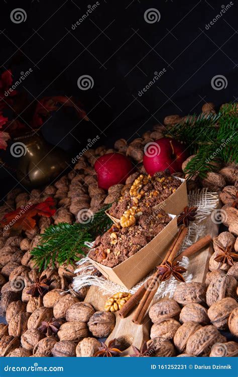 A Delicious Apple Chocolate Cake With Hazelnuts Stock Image Image Of