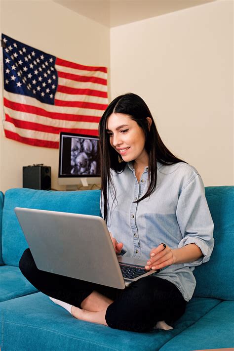 Woman In Living Room With Notebook Fourth Of July Del Colaborador De