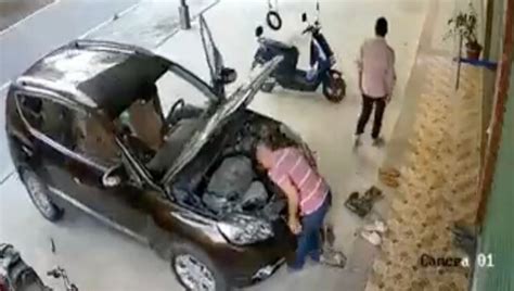 Man Gets Smashed By Parked Car While Fixing It Video Shivers Internet