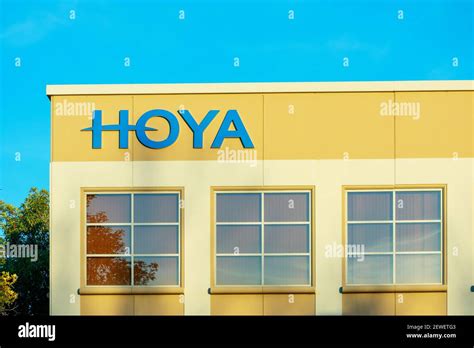 Hoya sign, logo on the facade of Hoya Corporation a Japanese company manufacturing optical ...