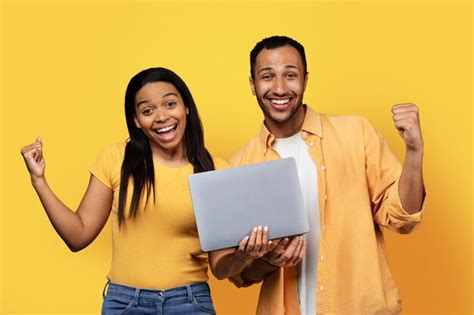 Premium Photo Glad Excited Millennial African American Couple With