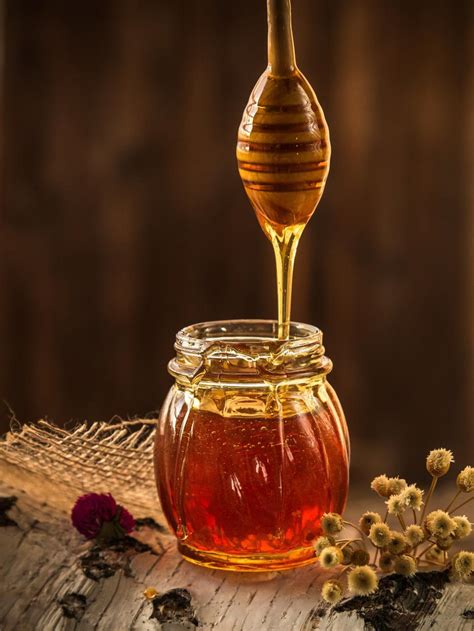 Free Stock Photo Of Honey Dripping From Dripper Into The Glass Jar