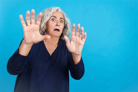 Elderly Lady Making Anxious Hand Gestures Afraid Shocked Conflict Photo