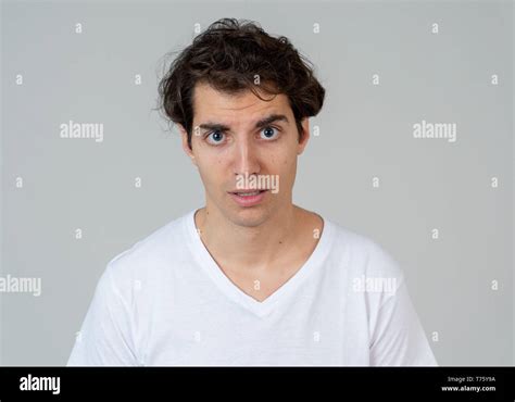 Thinking Funny Faces Portrait Of Worried Young Man Confused