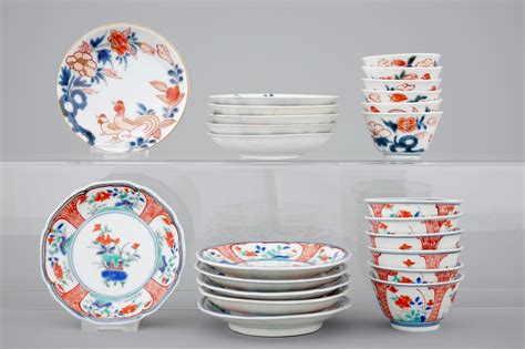 Twelve Japanese Porcelain Cups And Saucers Imari And Kakiemon 18th C