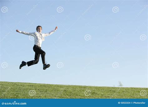 A Business Man Jumping for Joy Stock Photo - Image of spring ...