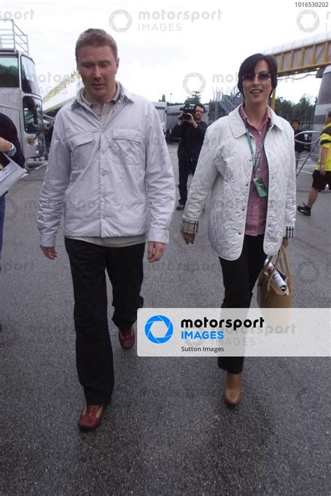 L R Mika Hakkinen FIN McLaren Mercedes MP4 16 With Wife Erja Arrive