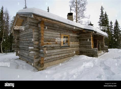 View of a traditional log cabin, Luosto, Lapland, Northern Finland ...