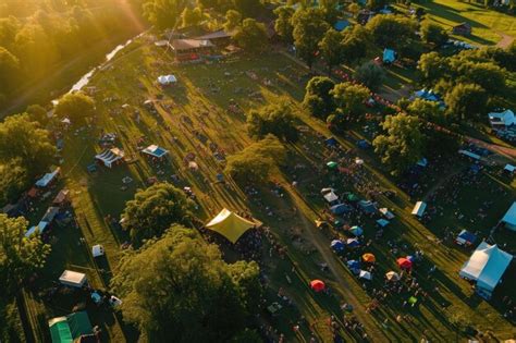 Premium Photo | Aerial View of Festival With Colorful Tents and Crowds ...