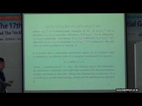 Fixed Point Sets Of Isometries And The Intersection Of Real Forms In A