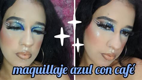 maquillaje azul café brillitos delineado blanco delineado negro y