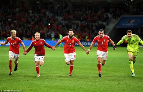 Wales Team Celebrate Historic Euro 2016 Victory Over Belgium By Leading