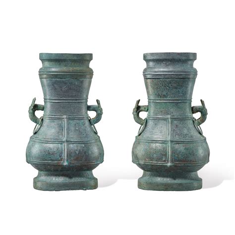 A Pair Of Large Archaic Bronze Ritual Wine Vessels And Cover Fanghu