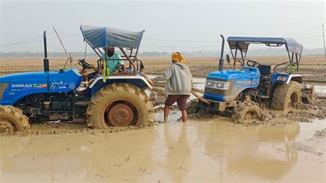 How To Pull Tractor Out Of Mud Youtube