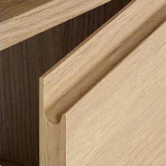 A Close Up View Of Wood Grains On The Side Of A Cabinet Door That Is