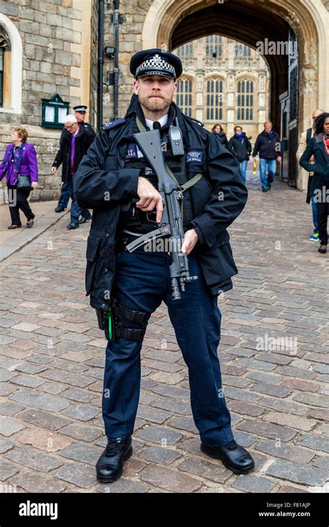 Armed British Police Officer Outside Windsor Castle, Windsor Stock ...