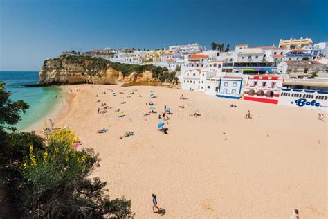 Tourist Sunbatching at Carvoeiro Beach. Editorial Stock Image - Image of shore, sunbathing: 92620094